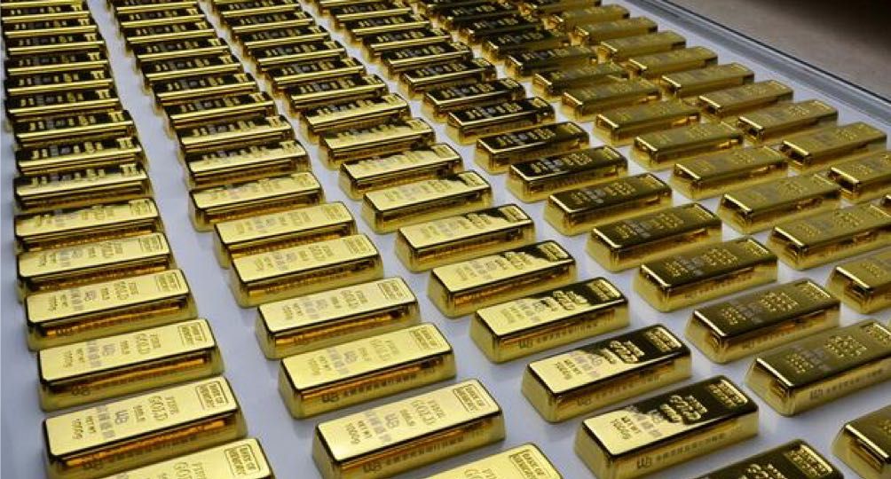 Gold bullion bars laid out